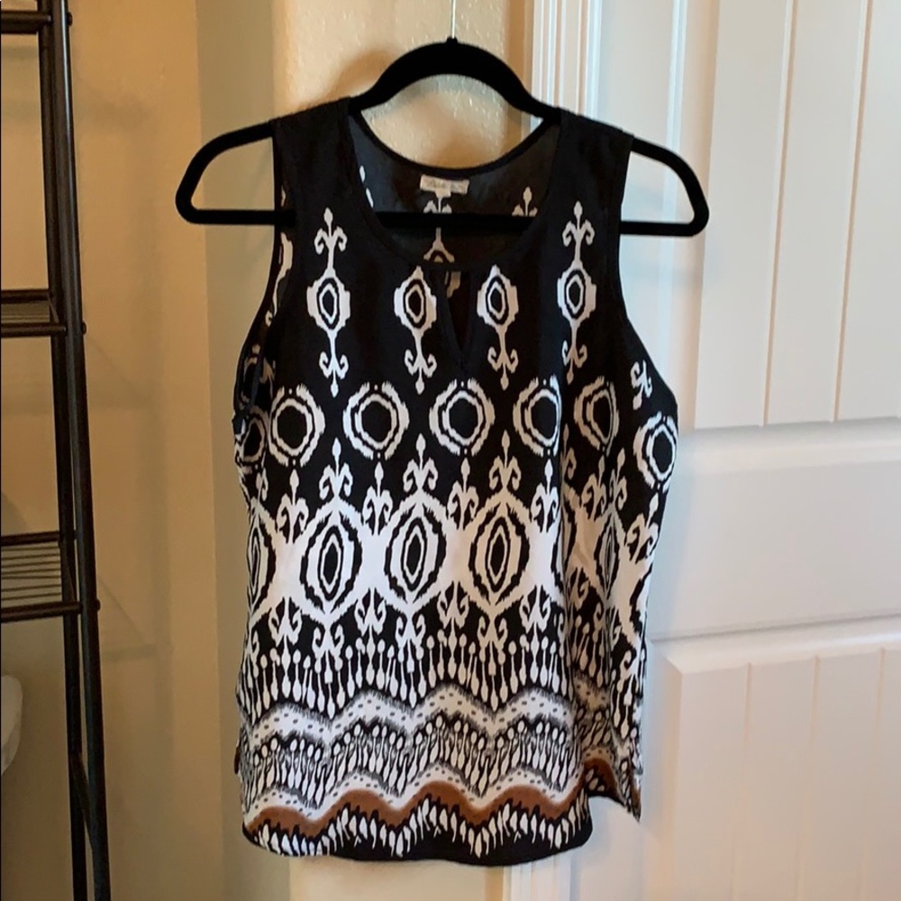 Black and white printed sleeveless blouse